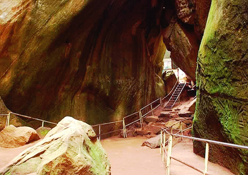 SCINQ Travel: Discover Prehistoric Stone Age Carvings at Edakkal Caves in Kerala.