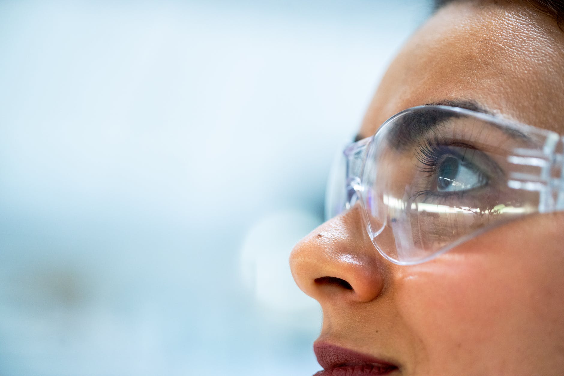 close up photo of woman wearing protective goggles