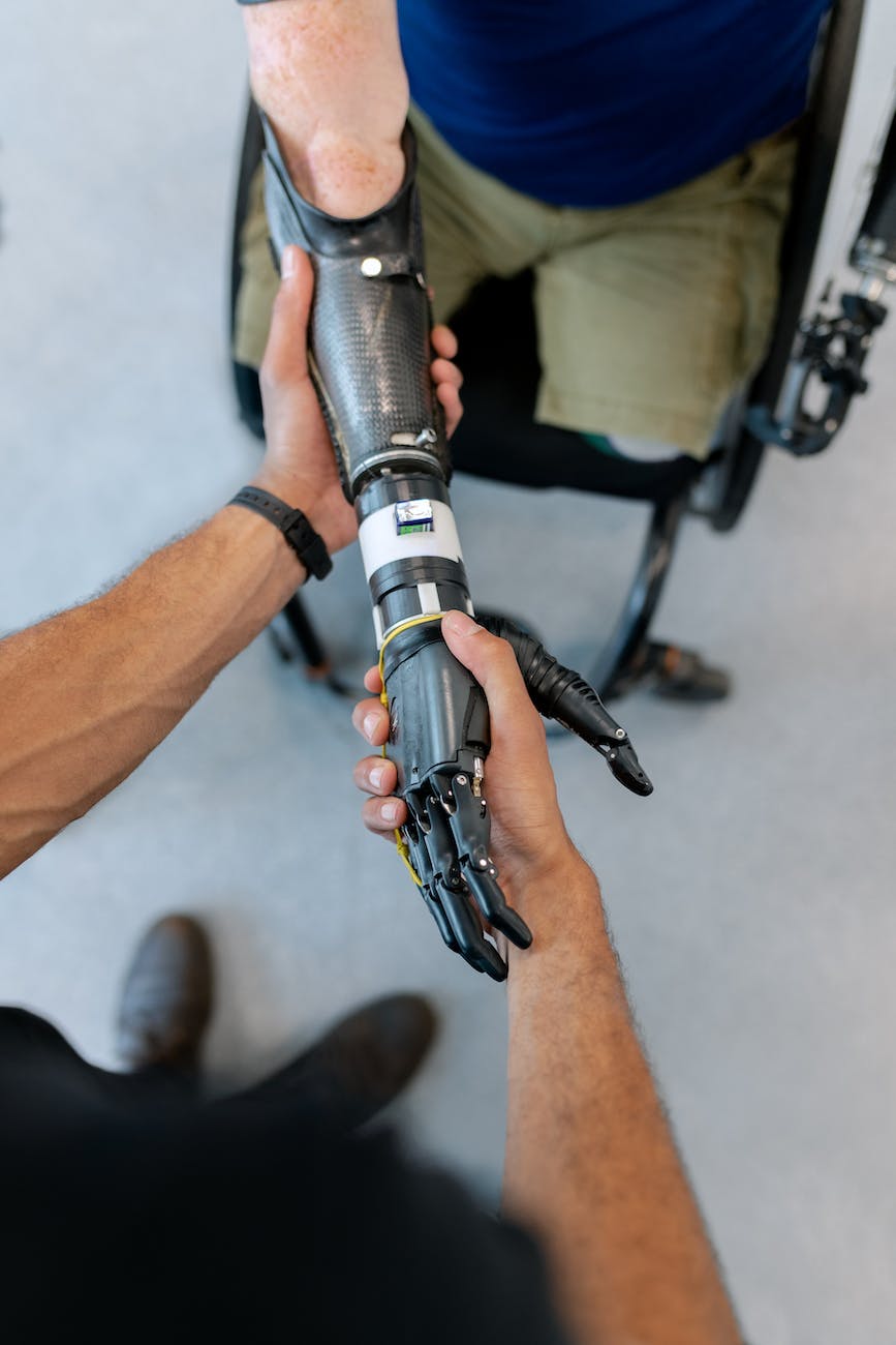 Cognitive strategies for augmenting the body with a wearable, robotic arm