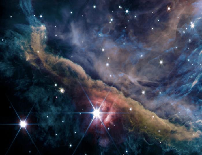 Ultraviolet radiation from massive stars shapes planetary systems