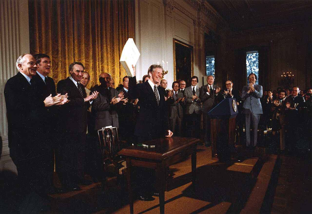 THE BIG PICTURE: President Jimmy Carter signs the Alaska National Interest Lands Conservation Act.