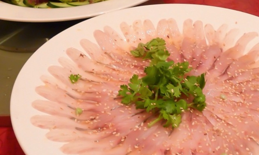 Sashimi fad in China sparks public health debate.